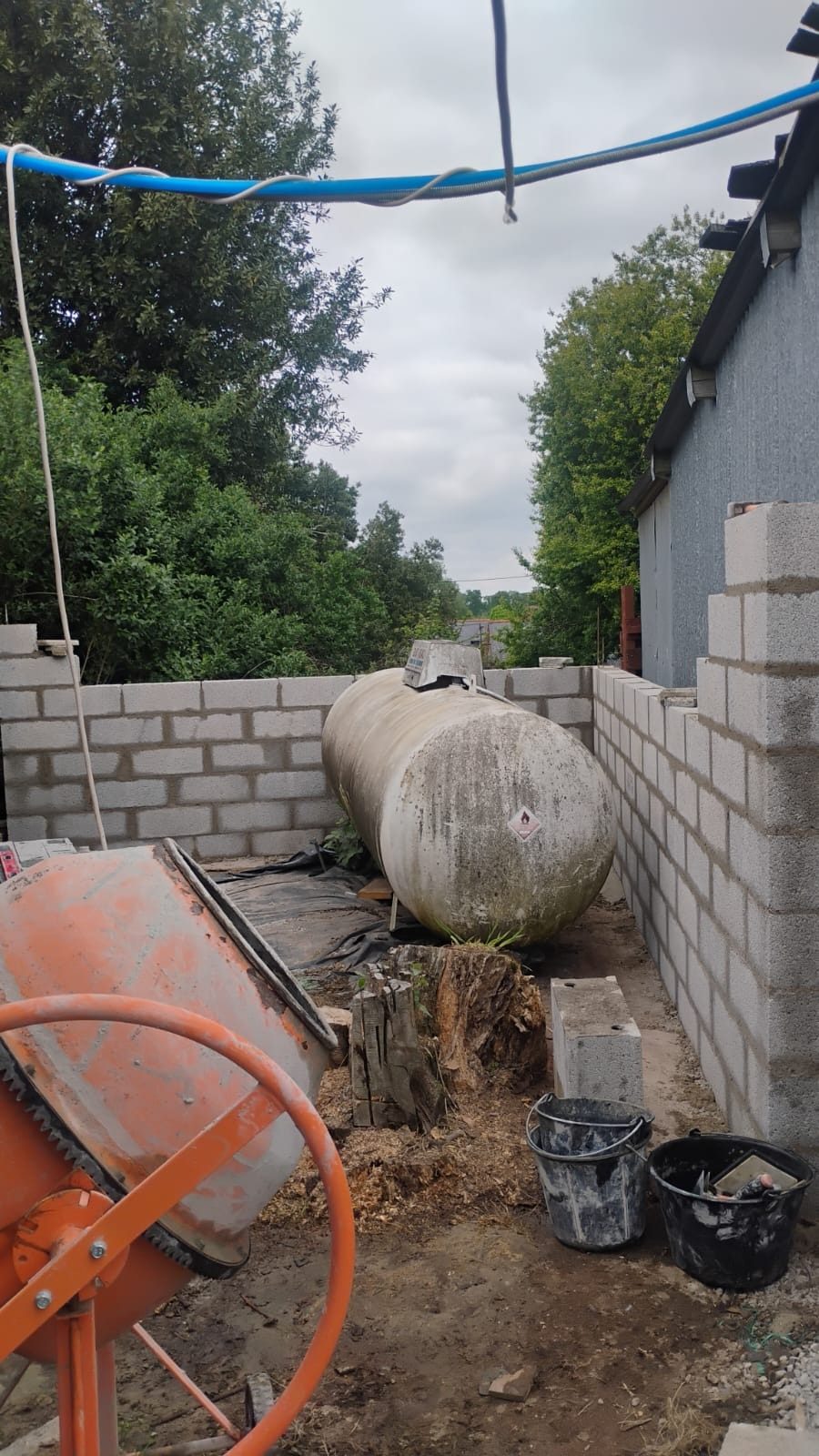 Block wall built around a tank