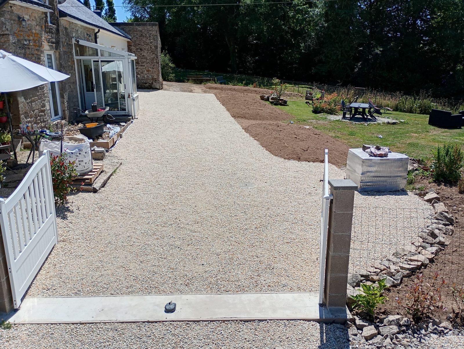 The same driveway: gravel laid, edged and ready
