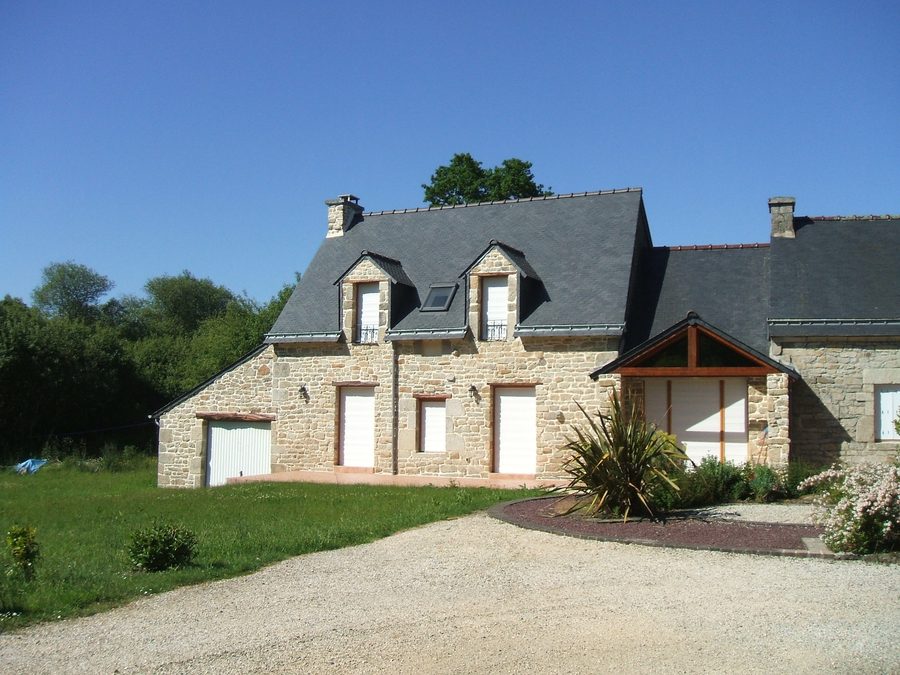Stone house repointed, with its gravel drive