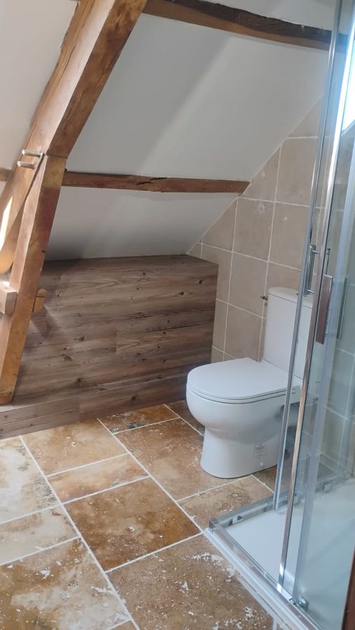 Attic bathroom: finished, travertine and shower