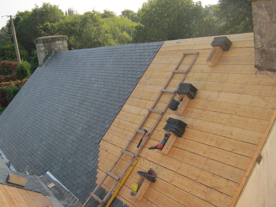 Half way: new boards on one side, slates on the other