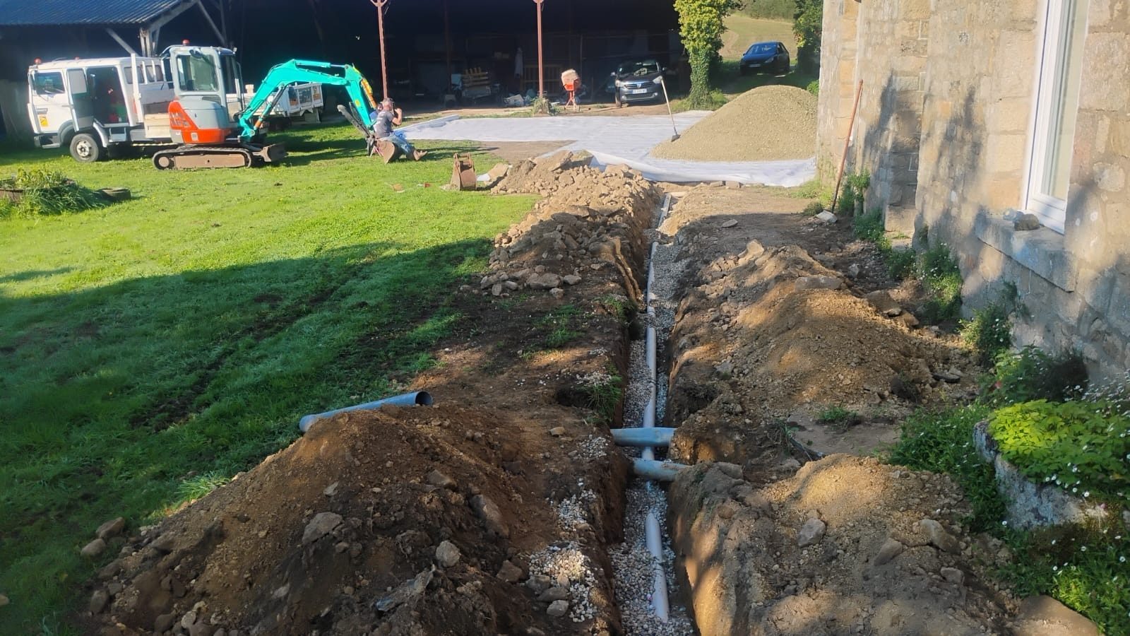 Pipe trench dug across the garden